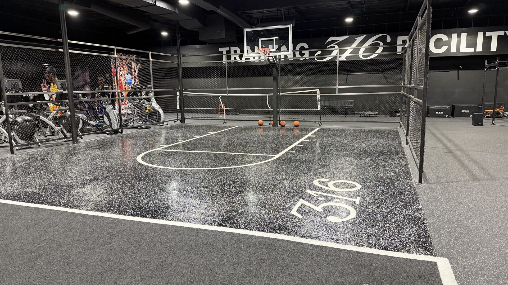Indoor half basketball court with 3:16 inlay