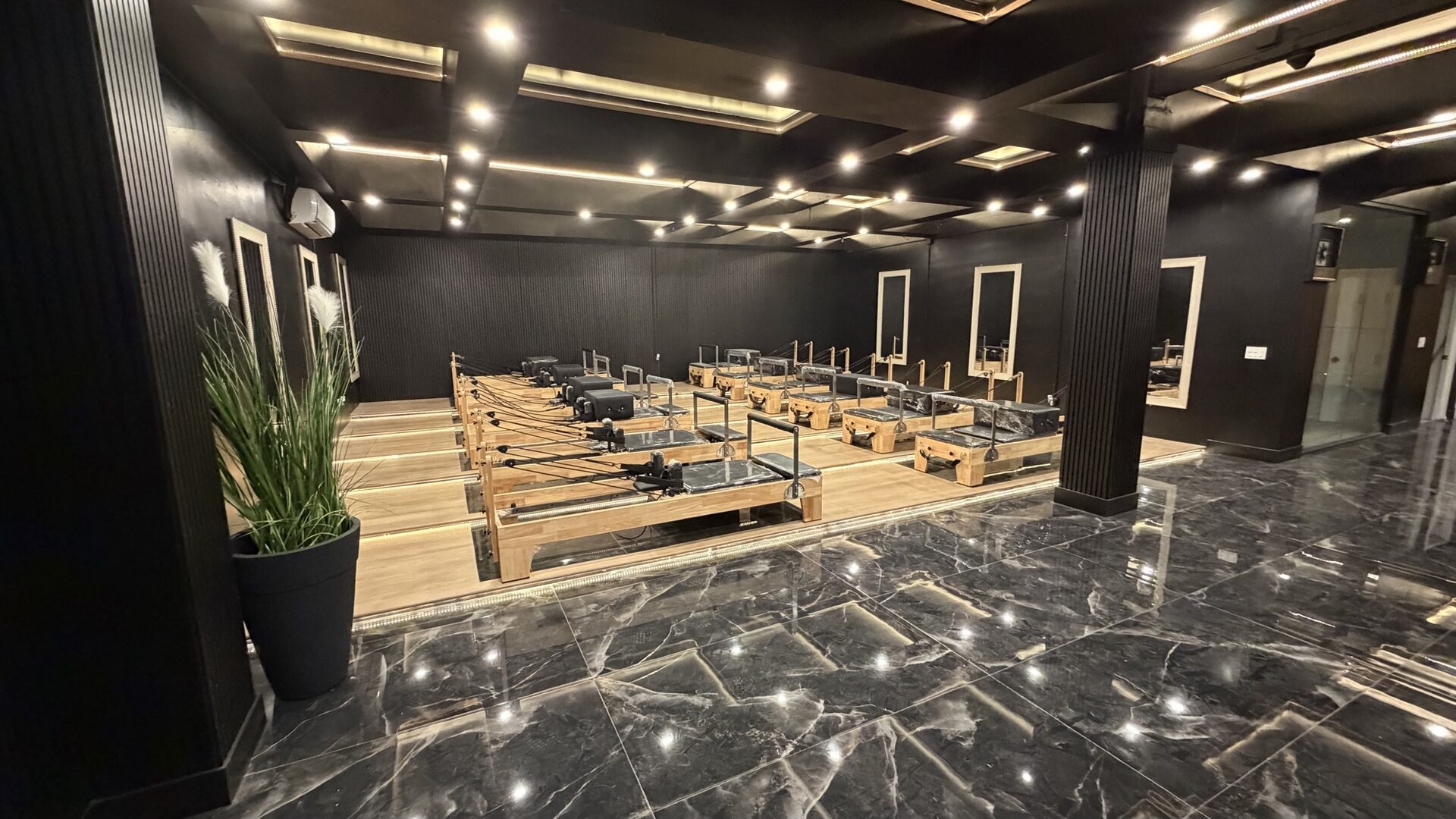 Reformer Pilates studio with 16 reformers